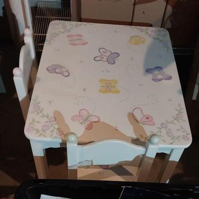 Childâ€™s table and chairs