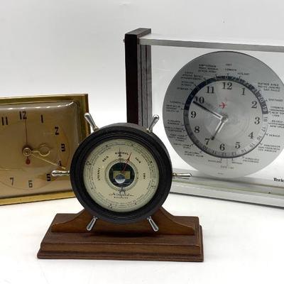 Seth Thomas desk clock, Verichron world time clock with box, and Airguide barometer