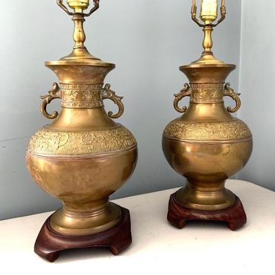 Pr. of antique brass Asian lamps
