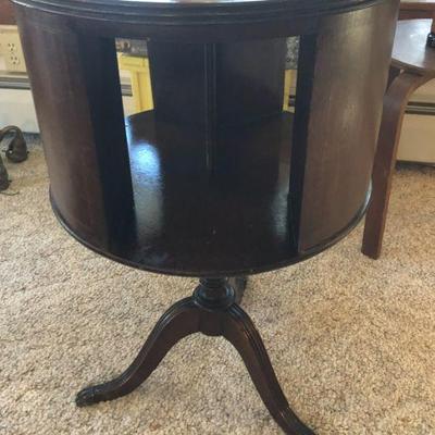 Revolving table top with book slots