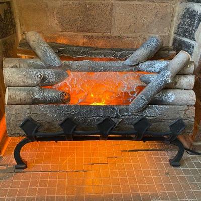 Faux fireplace logs with flickering light