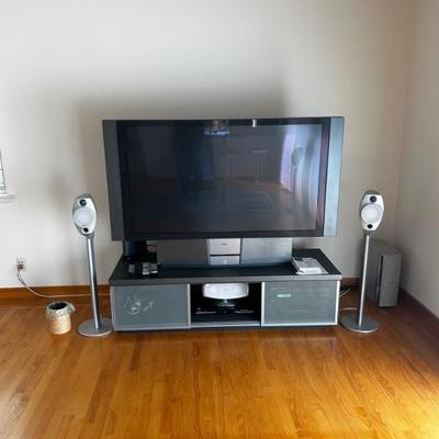 Large flat screen TV with stand 