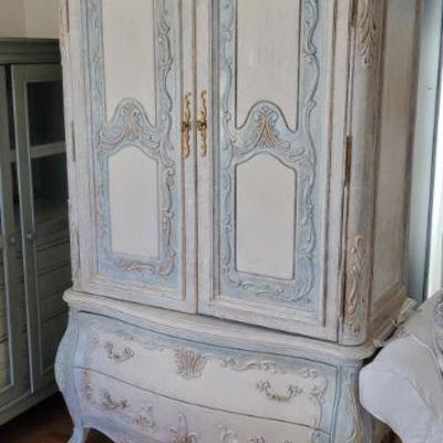 white and aqua with silver painted storage armoire
