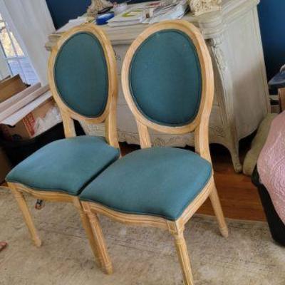 Teal linen upholstered oval back dining chairs, 