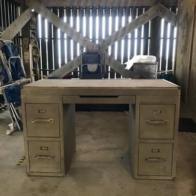 Restoration hardware campaign style canvas covered desk.