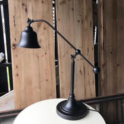 Adjustable arm lamp by Coaster Fine Furniture