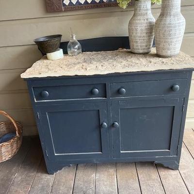 small cabinet with stone top