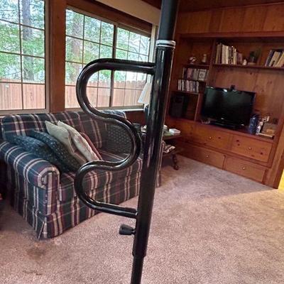 This is a pull up bar for people with mobility issues, getting out of chairs.
