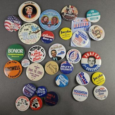 Lot 10 | 30 Vintage Political Buttons. Includes Clinton, Bush, Jacobs, Dukakis and more.