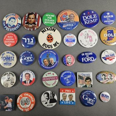 Lot 98 | 30 Vintage Political Pins. Some names include McCarthy, Ford, Humphrey, Wallace, Dole, Bush, Gore and more