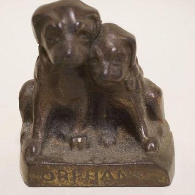 1020	ANTIQUE CAST IRON DOG BOOKENDS *ORPHANS* APPROXIMATELY 4 IN X 5 IN HIGH
