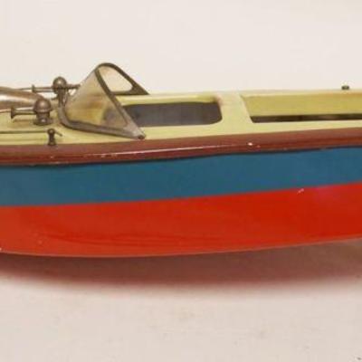 1156	TOY MOTORIZED METAL BOAT, APPROXIMATELY 6 IN X 16 IN X 5 IN HIGH
