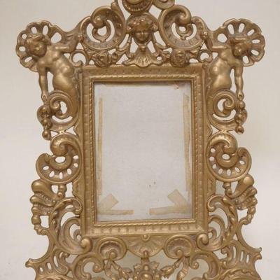 1192	ORNATE VICTORIAN CAST METAL PICTURE FRAME WITH CHERUBS, APPROXIMATELY 10 IN X 14 1/2 IN H
