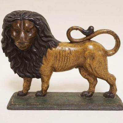 1018	ANTIQUE CAST IRON LION DOOR STOP, APPROXIMATELY 12 IN X 9 IN HIGH
