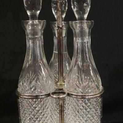 1079	VICTORIAN CASTOR SET W/5 CLEAR BOTTLES IN SILVERPLATE HOLDER, APPROXIMATELY 14 1/2 IN HIGH
