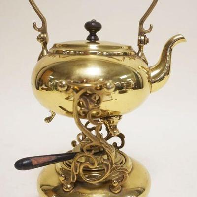 1165	ELEGANT BRASS TILTING TEA POT WITH WARMER, MADE BY S. STEINA CO., APPROXIMATELY 10 IN H
