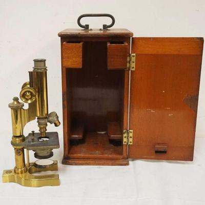 1040	ANTIQUE BAUSCH & LOMB OPTICAL CO BRASS MICROSCOPE IN FITTED MAHOGANY WOOD CASE, APPROXIMATELY 8 IN X 9 IN X 15 IN HIGH
