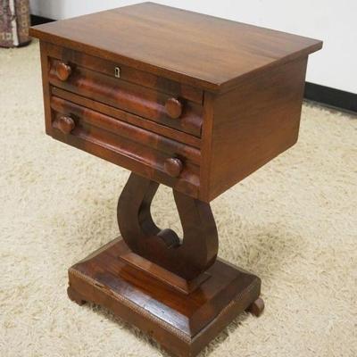 1105	MAHOGANY EMPIRE 2 DRAWER STAND W/LYRE CENTER, APPROXIMATELY 20 IN X 15 IN X 29 IN HIGH
