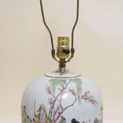 1077	ASIAN PORCELAIN COVERED JAR RETROFITTED & DRILLED FOR TABLE LAMP, APPROXIMATELY 12 1/2 IN HIGH W/SCRIPT ON REVERSE

