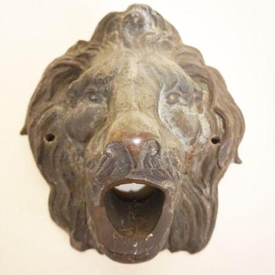 1054	LARGE ANTIQUE BRONZE CAST LION'S HEAD POSSIBLE OPENNING FOR FOUNTAIN, APPROXIMATELY 9 IN X 11 IN
