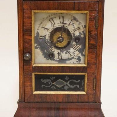 1044A	ANTIQUE MINIATURE SETH TOMAS SHELF CLOCK W/ALARM, APPROXIMATELY 4 IN X 7 IN X 9 IN HIGH
