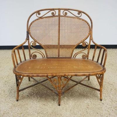 1132	VICTORIAN CANE & RATTAN SETTEE, APPROXIMATELY 42 IN X 23 IN X 41 IN HIGH
