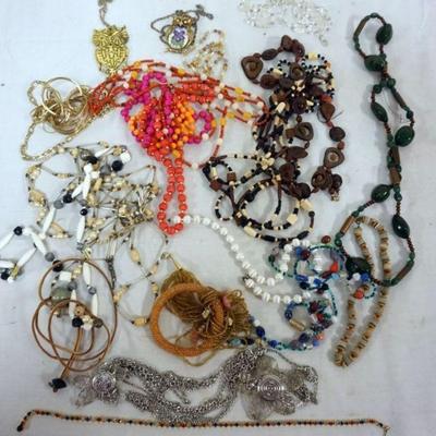 1278	LARGE LOT OF ASSORTED NECKLACES INCLUDING BEADED WITH WOOD AND GLASS
