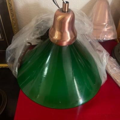 Kitchen hanging light fixture green glass with bronze hardware. New 