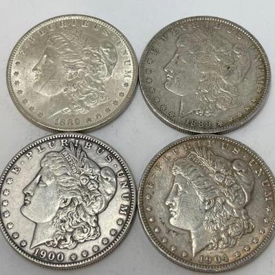 #606 â€¢ (4) Morgan Silver Dollars
