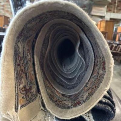 #5102 â€¢ Rolled up house rug
