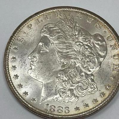#592 â€¢ 1883 Morgan Silver Dollar
