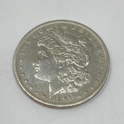 #590 â€¢ 1891 Morgan Silver Dollar
