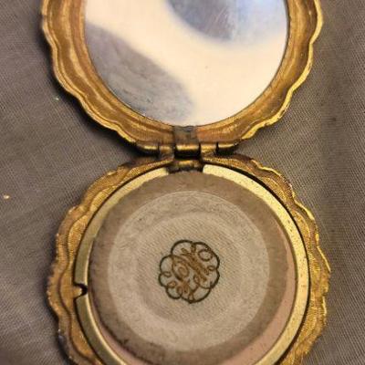 Vintage compact with mirror and powder