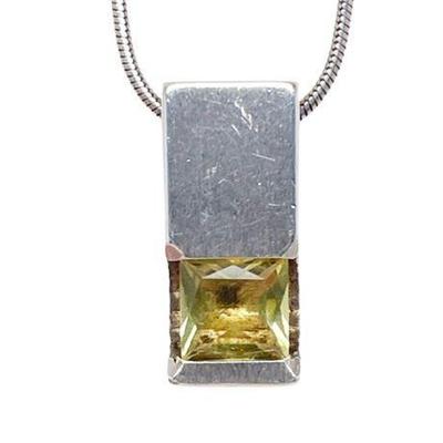 Lot 062  
2 Carat Citrine and Sterling Silver Column Pendant Marked LoR