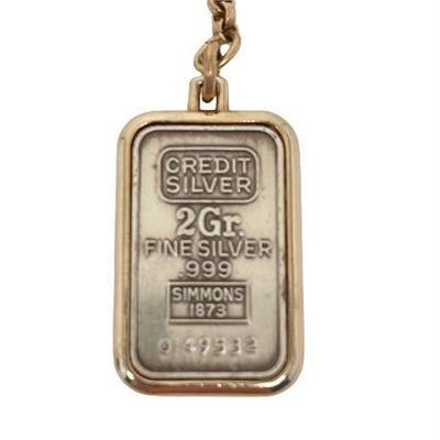 Lot 068  
2 Gr Fine Silver Fob with Serial Number