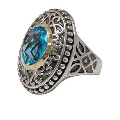 Lot 007 
Blue Topaz, 14 K Gold and Sterling Silver Statement Ring
