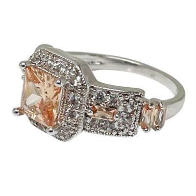 Lot 103   
Sterling Silver Fashion Cocktail Ring Orange Crystal Center Stone