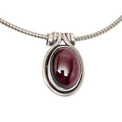 Lot 065  
Amethyst Cabochon and Sterling Silver Pendant