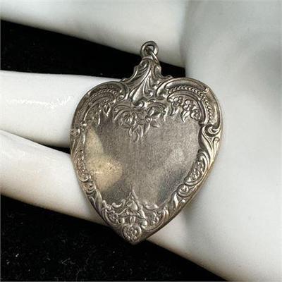 Lot 035-111   2 Bid(s)
Wallace Sterling Silver Floral Heart Pendant, Vintage