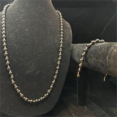 Lot 060-015   0 Bid(s)
Black and Gold Beaded Matching Necklace and Bracelet
