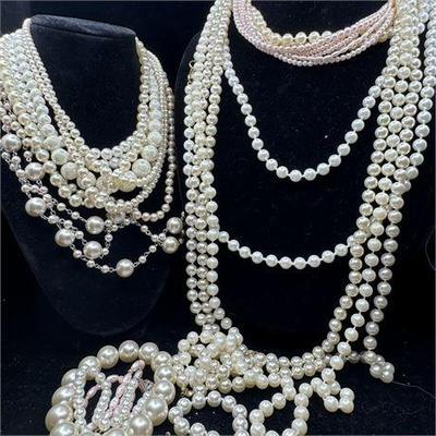 Lot 050   0 Bid(s)
Vintage Faux Pearl Costume Necklaces and Bracelets Grouping