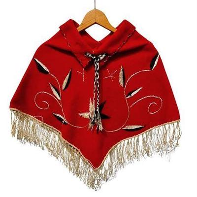 Lot 034-094   1 Bid(s)
Vintage Southwestern Red Wool Embroidered Collar Poncho with Silk Fringe