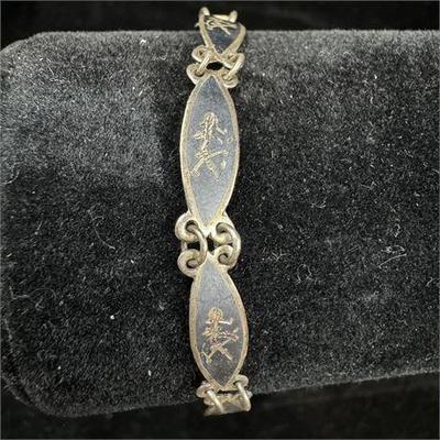 Lot 041-106   0 Bid(s)
Thai Sterling Silver Link Bracelet