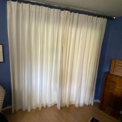 3 sets of white satin drapes