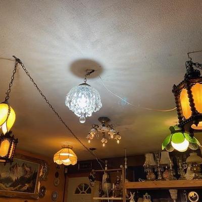 Ceiling Lights showing both wood and slag chain lights