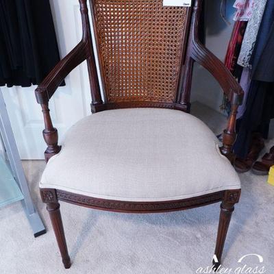 Cane Back Arm Chair (36â€h x 24â€ w x 23â€d)