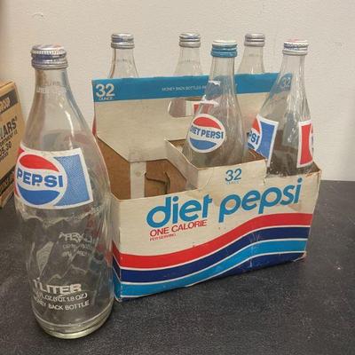 Pepsi Swirl 32oz bottles in 6-pack holder