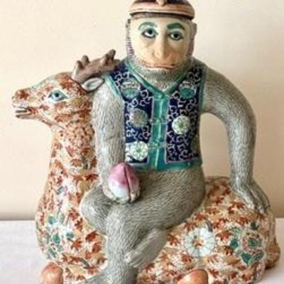 Vintage Chinese Porcelain Tea Pot in the Form of a Monkey holding a peach (sign of longevity) and sitting on the back of a deer 

Item in...