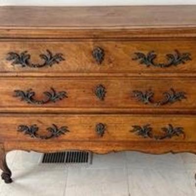 Antique Chest of Drawers, likely 19th Century and European 

Gorgeous! Features lovely drawer pulls and key hole hardware 

Natural...