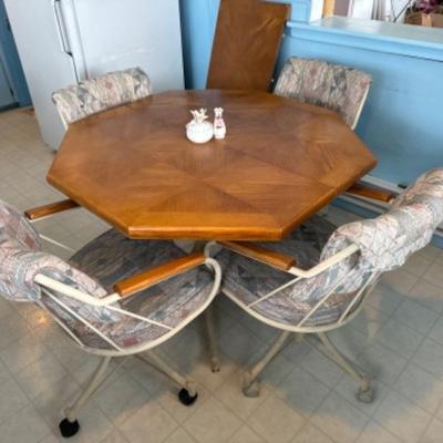 Rolling Oak Kitchen table with leaf and 4 chairs